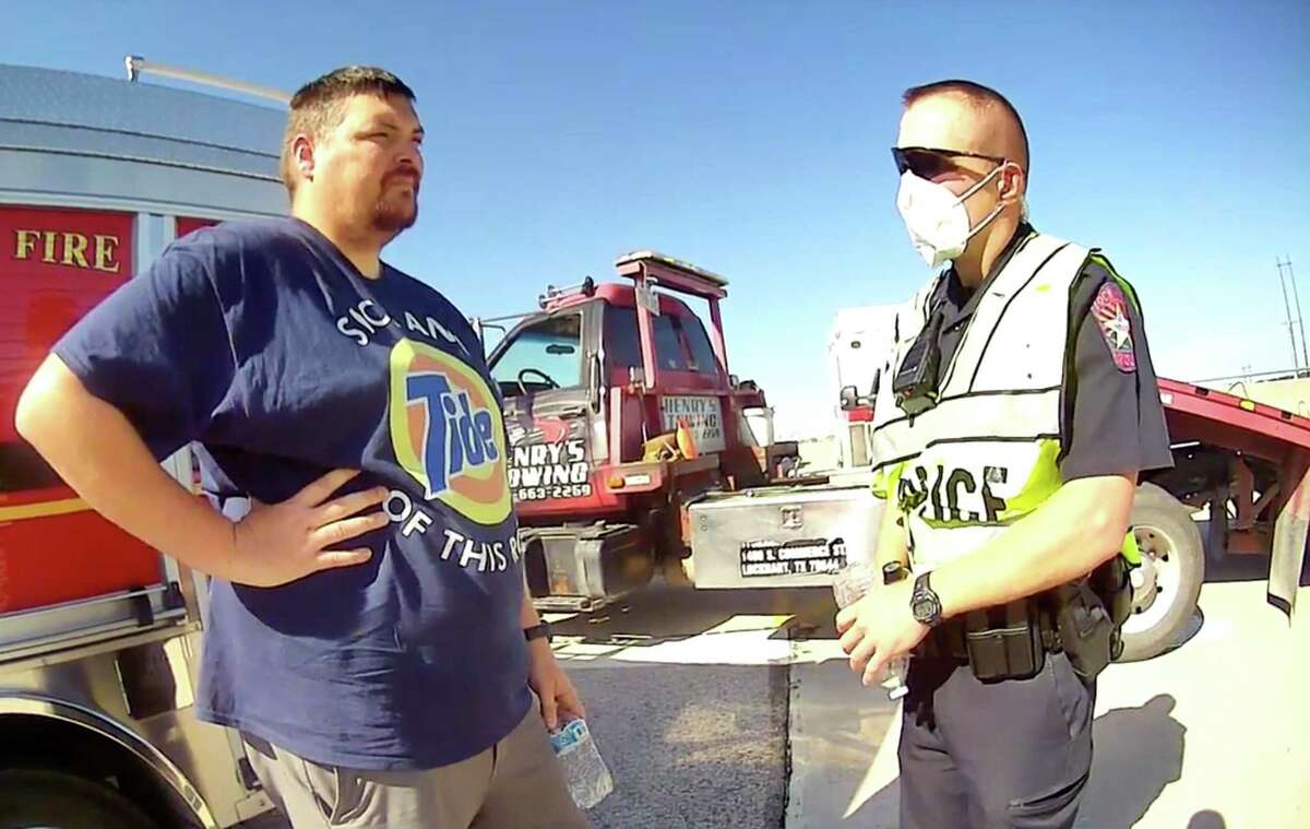 Former San Marcos Police Department Sergeant Ryan Hartman is seen in Lockhart Police Department body camera footage from June 10, 2020. Hartman was cited for running a stop sign and causing a wreck that killed one woman and injured another.