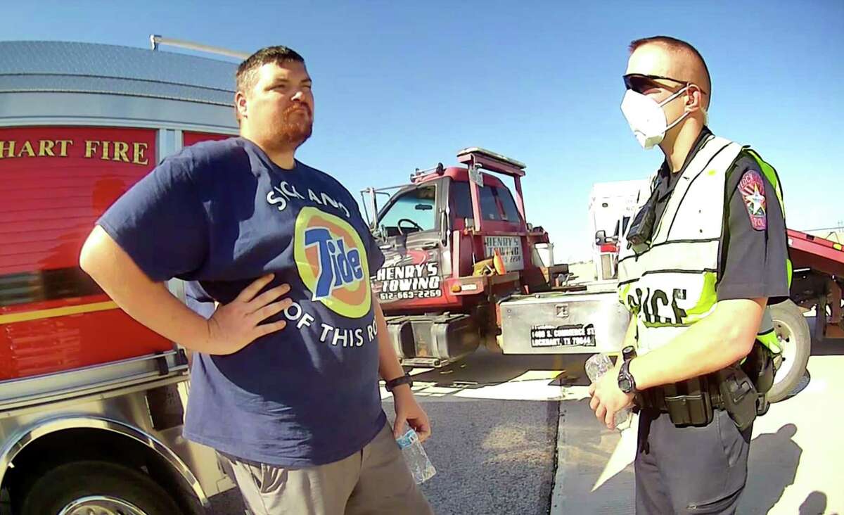 Former San Marcos Police Department Sergeant Ryan Hartman is seen in Lockhart Police Department body camera footage from June 10, 2020. Hartman was cited for running a stop sign and causing a wreck that killed one woman and injured another.