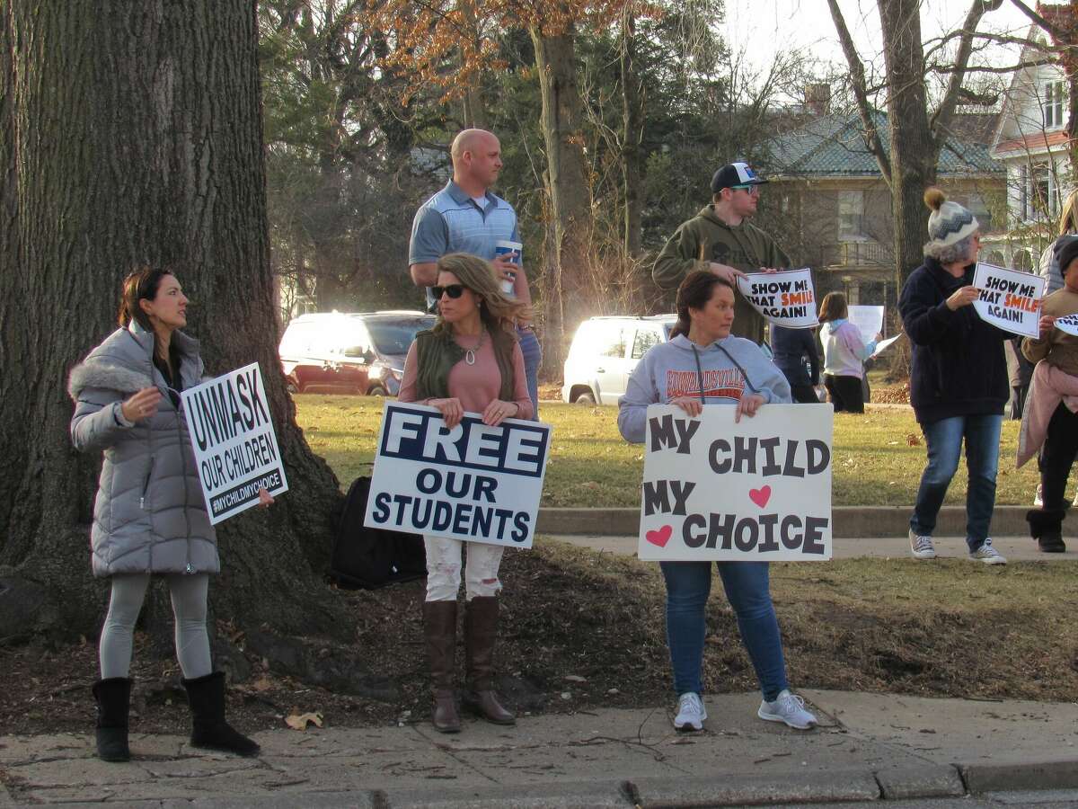 Several individuals from District 7 as well as surrounding communities protested outside of the Hadley House on Tuesday during a Show Me Your Smile Rally. 