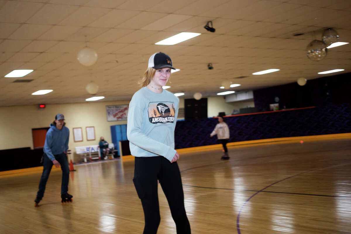 Grace Powell, 17, takes a lap around the rink during "Let's Roll Together," an event hosted by The Arc of Midland and Roll Arena, Tuesday, Feb. 15, 2022.
