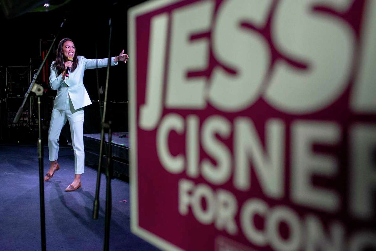 U.S. Rep. Alexandria Ocasio-Cortez speaks at a rally at Paper Tiger, a San Antonio concert venue, on Feb. 12, 2022. 