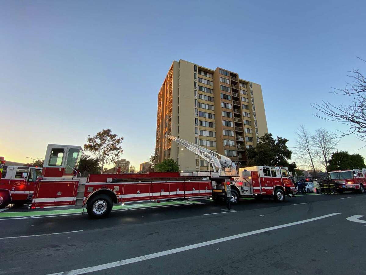 Four people, including two Oakland firefighters, were taken to local hospitals after a fire broke out in an Oakland Housing Authority Building residential tower on Tuesday afternoon, Oakland fire officials said.