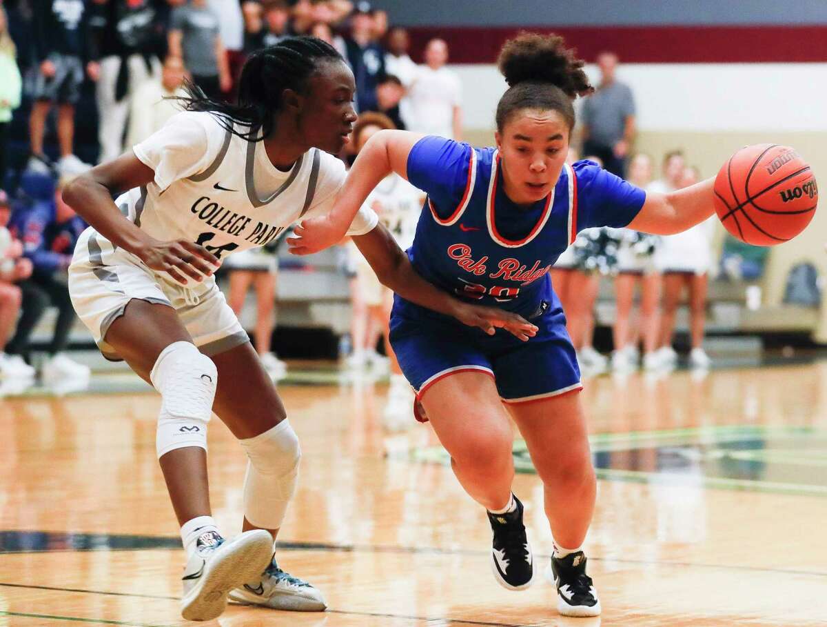Oak Ridge point guard Taylor Jones (30), shown here last week, led the Lady War Eagles in scoring against Spring Tuesday night in a Region II-6A bi-district playoff.