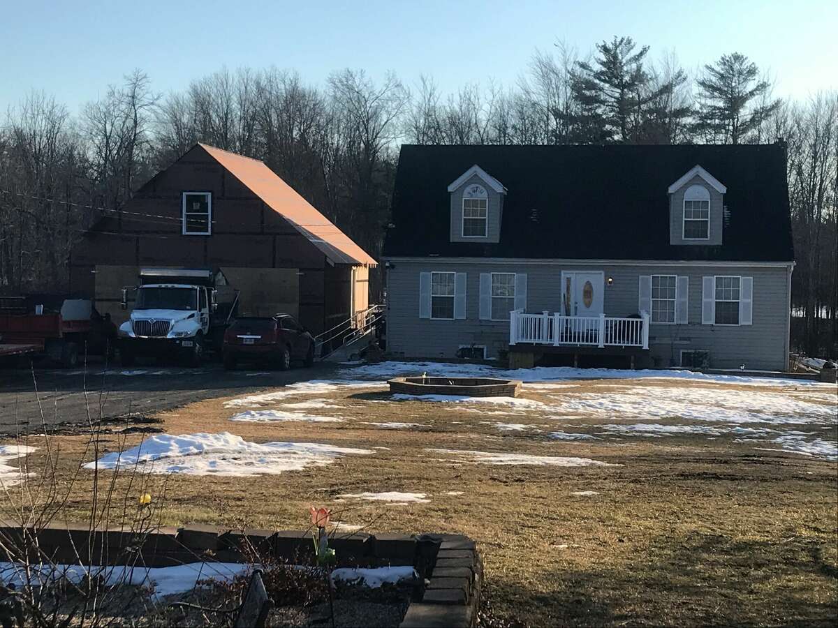 The house in Saugerties where police allegedly found a young girl squirreled away in a secret compartment to hide her from police. The child's biological parents, who were at the house when a warrant was served, were charged with felony custodial interference.