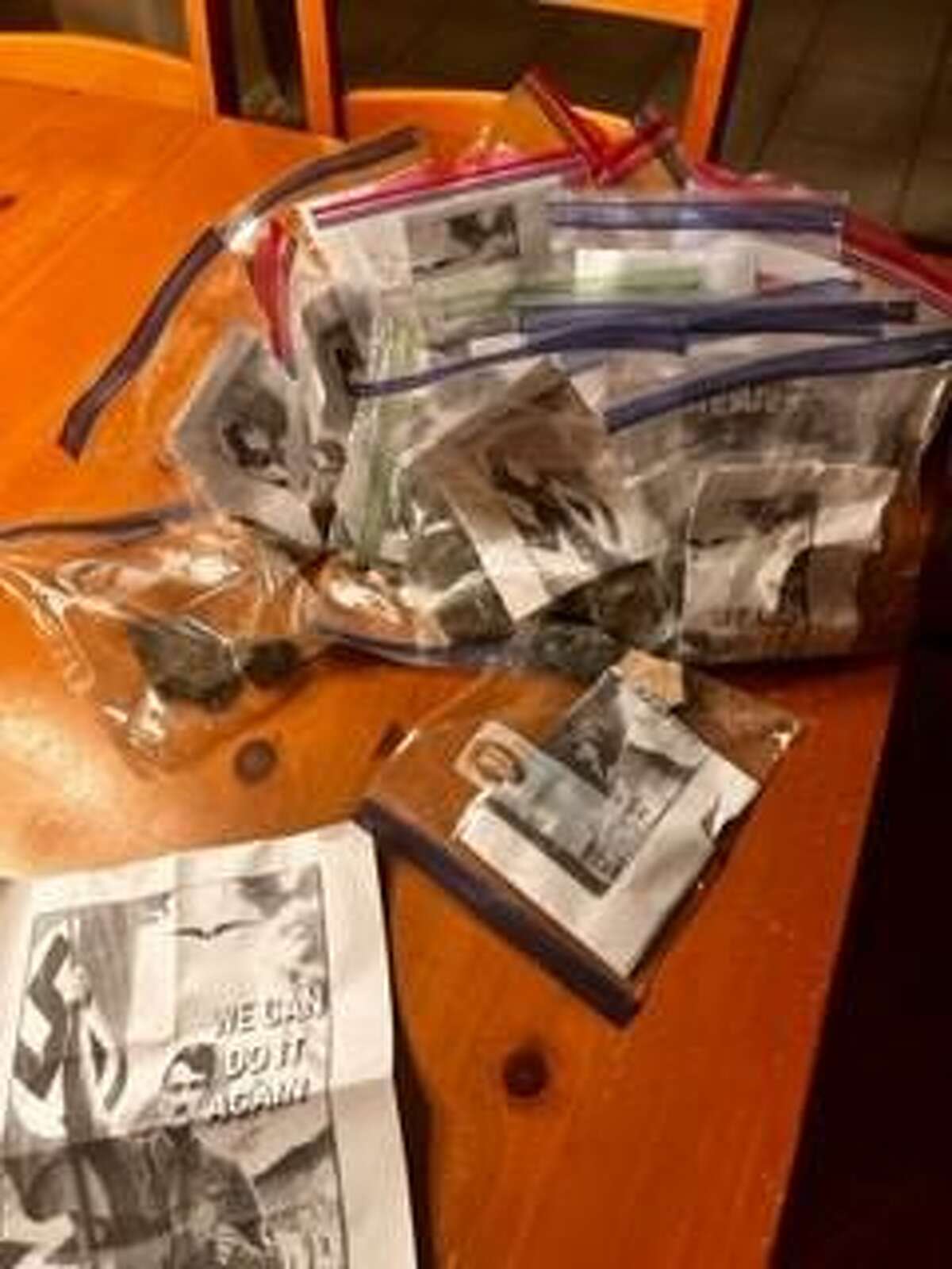Photos of white supremacist flyers collected by Stacie Brady in her Atascocita subdivision the morning of Feb. 13, 2021.