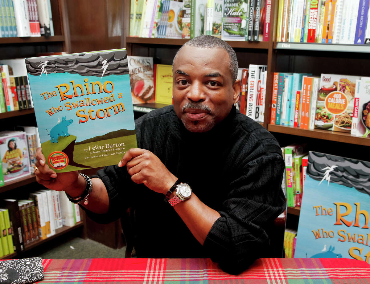 LeVar Burton signs and discusses his book 'The Rhino Who Swallowed A Storm' at Barnes & Noble Booksellers on December 20, 2014 in Burbank, California.
