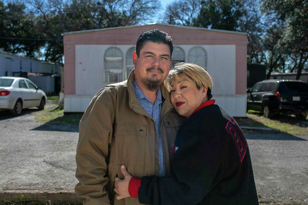 Joseph Cerbantez and Griselda Vasquez-Cerbantez, who have struggled to get relief from Hays County’s Emergency Rental Assistance program, stand outside their home Feb. 5 in San Marcos.