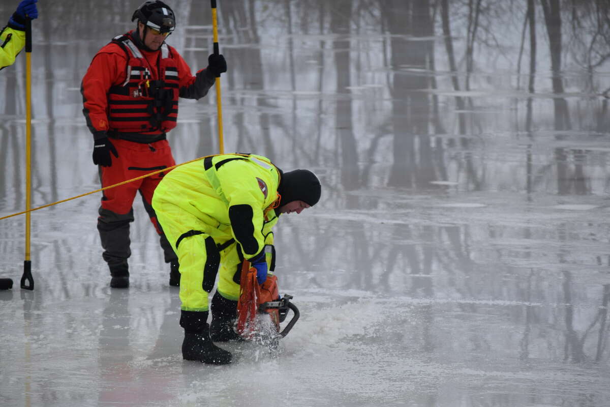 Members of the Jacksonville Fire Department take part in an ice rescue training Wednesday. 