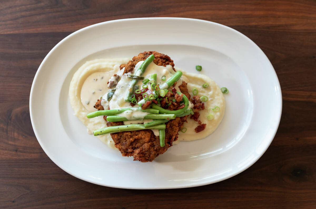 Wild Oats serves Wagyu chicken-fried steak with green beans cooked in Steen Cane's syrup.