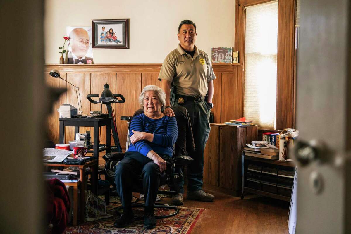 San Francisco Sheriff’s Office Sheriff Paul Miyamoto, left, jokes with his mom Ella at their home in San Francisco, California Friday, Feb. 11, 2022. Miyamoto, a native of San Francisco, is the first Asian American sheriff in California.