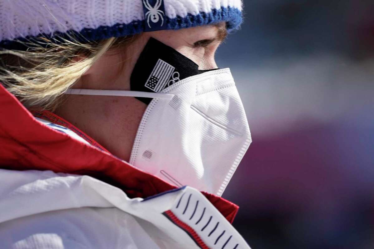 Mikaela Shiffrin, of the United States in the finish area after women's downhill training at the 2022 Winter Olympics, Monday, Feb. 14, 2022, in the Yanqing district of Beijing. (AP Photo/Luca Bruno)