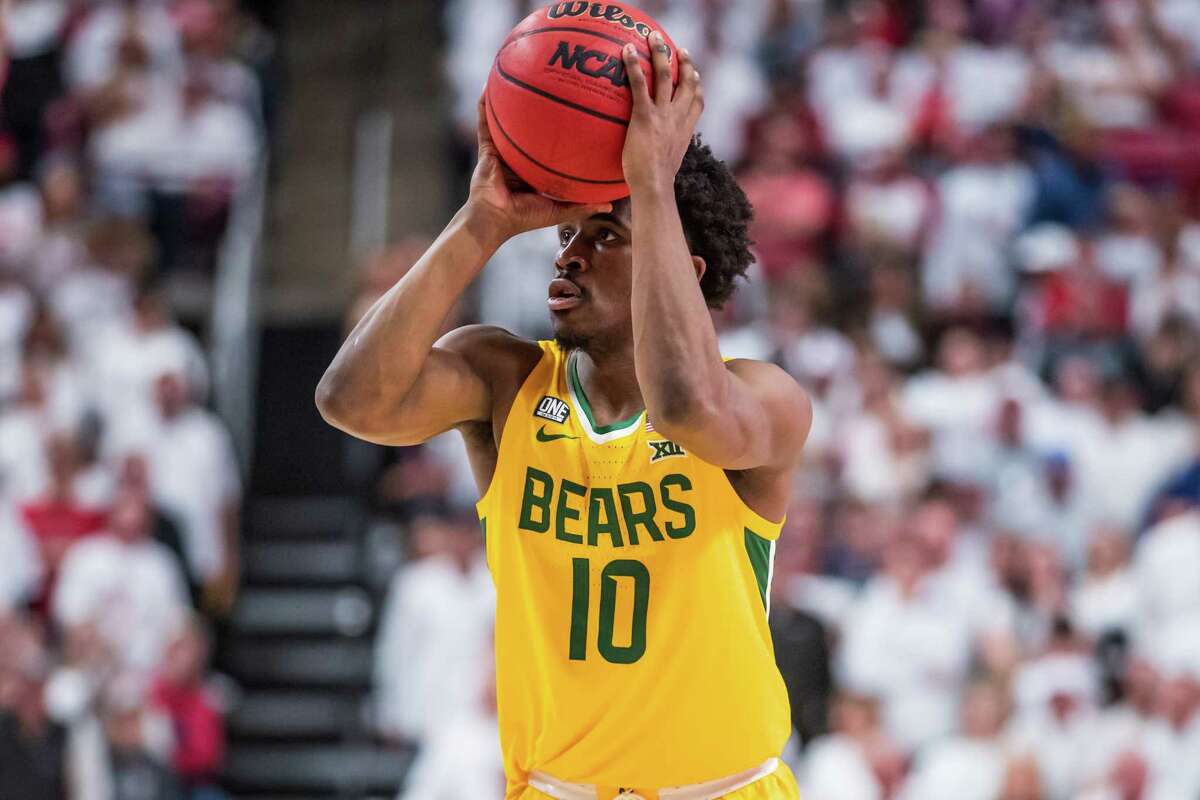 LUBBOCK, TEXAS - FEBRUARY 16: Guard Adam Flagler #10 of the Baylor Bears shoots the ball during the second half of the college basketball game against the Texas Tech Red Raiders at United Supermarkets Arena on February 16, 2022 in Lubbock, Texas.