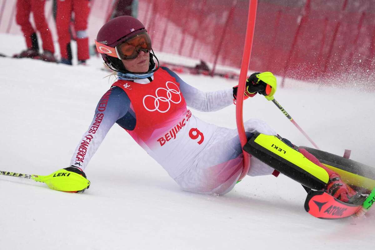 Mikaela Shiffrin of the United States crashes out during the women's combined slalom at the 2022 Winter Olympics, Thursday, Feb. 17, 2022, in the Yanqing district of Beijing. (AP Photo/Robert F. Bukaty)