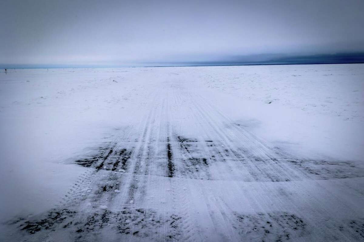 FILE — The Northwest Angle ice road is seen closed due to a storm in Lake of the Woods between Warroad and Angle Inlet, Minn. on Jan. 17, 2022. (Photo by Kerem Yucel/AFP via Getty Images)