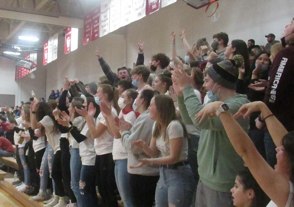The Benzie Central student section celebrates a made 3-point shot on Wednesday, Feb. 16 at Benzie Central high school. 
