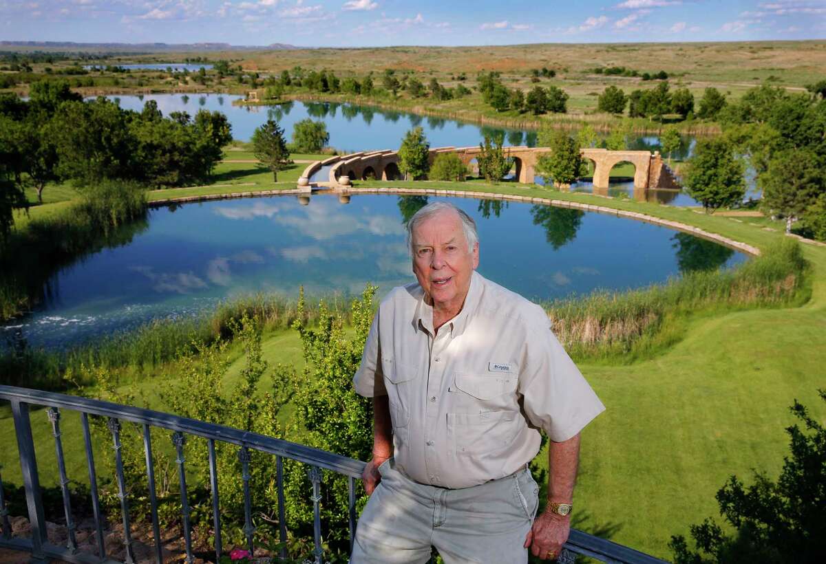 In this May 30, 2017, file photo, oil tycoon T. Boone Pickens poses for a photo on his Mesa Vista Ranch in the panhandle of Texas.