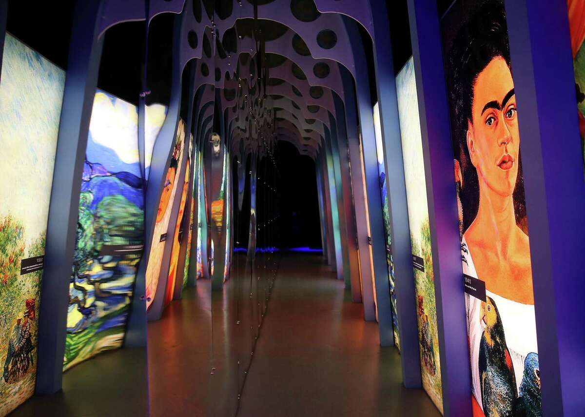 A mirrored walk way for “Immersive Frida Kahlo” on Wednesday, Feb. 16, 2022 in Houston. The exhibit shows Mexican artist Frida Kahlo’s story and art through a series of projections.