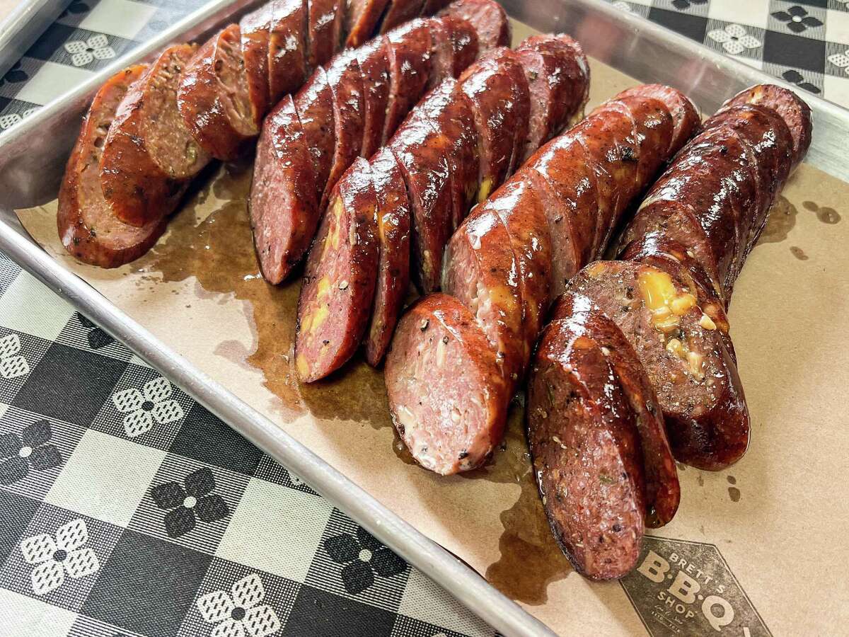 Sausages at Brett's BBQ Shop, from left to right: all-pork tamale, all-beef original housemade, all-beef original with cheddar, pork-and-beef roasted garlic with cheddar, all-beef serrano chile and cheddar