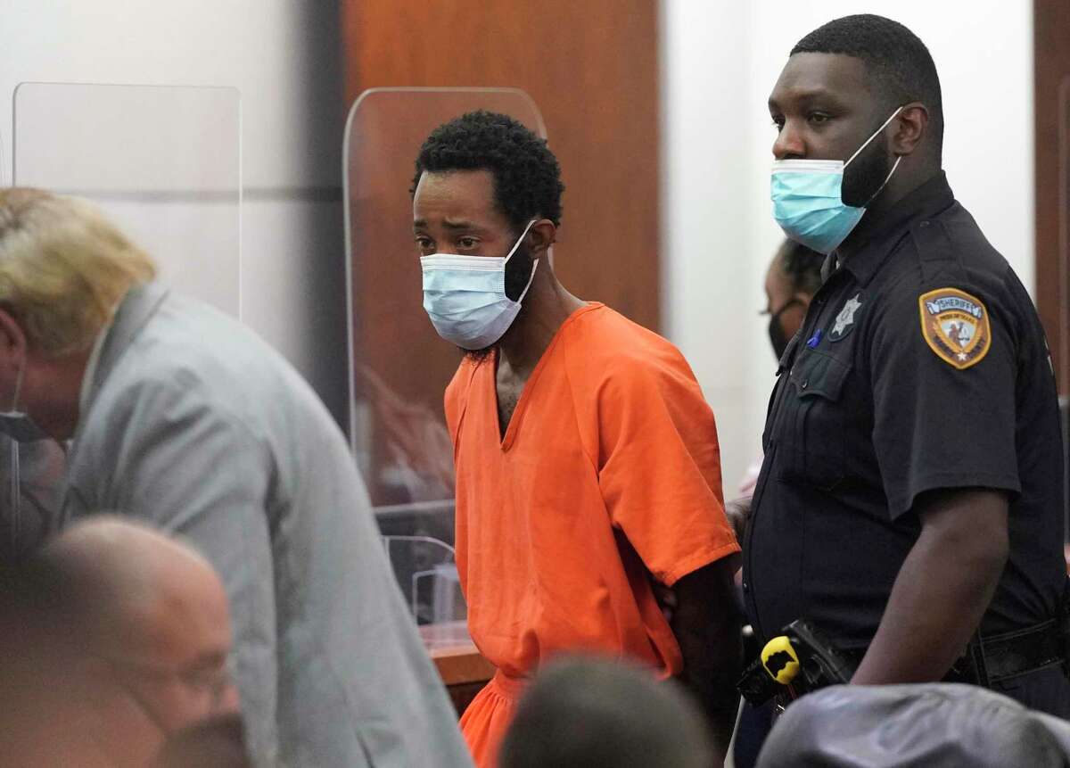 Tony D. Earls is escorted from the Harris County 263rd District Criminal Court Thursday, Feb. 17, 2022, in Houston. He is accused of shooting and killing 9-year-old, Arlene Alvarez, while firing at what he thought was a robbery suspect's vehicle as her father drove her and her siblings by a Chase bank on Winkler Drive, near the 2900 block of Woodridge Drive.