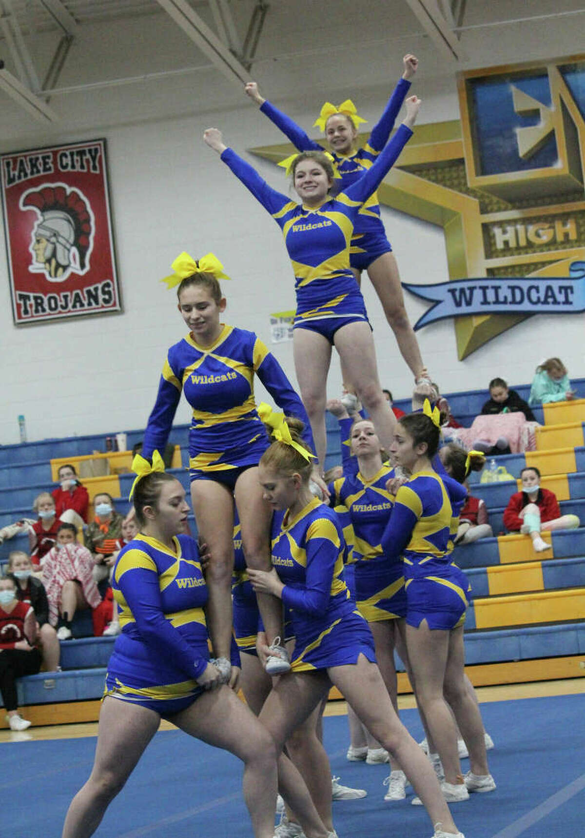 The Evart High School competitive cheer team competes at a recent event.