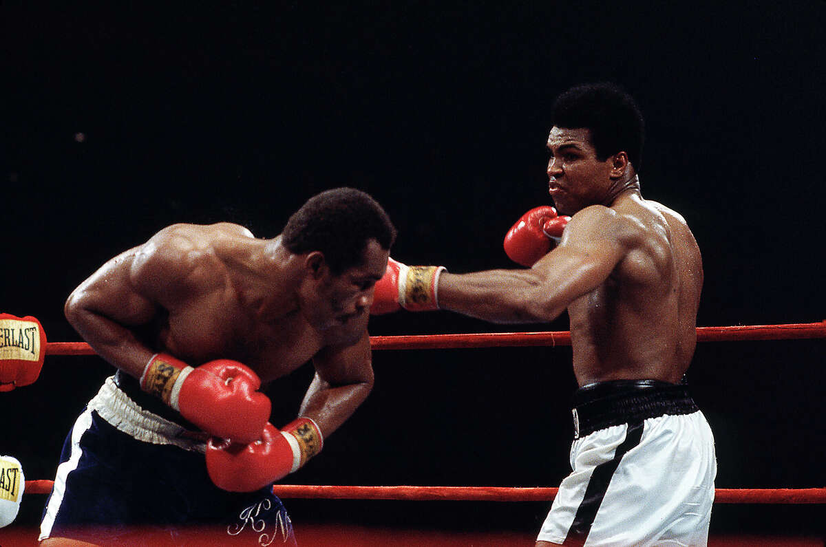 Ken Norton (left) and Muhammad Ali box Sept. 10, 1973, at the Forum in Inglewood, California.