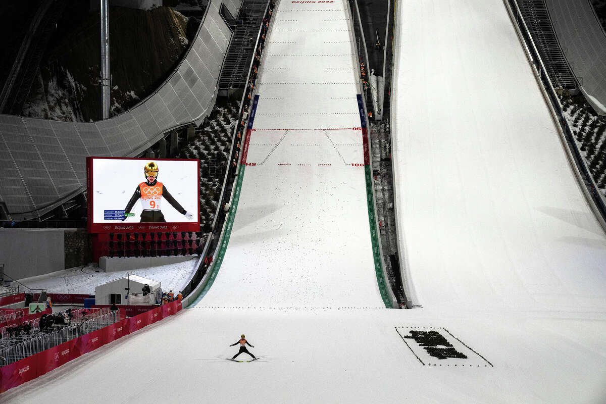 Ursa Bogataj of the Slovenian team participates in a practice session ahead of the mixed team ski jumping event during the Beijing 2022 Winter Olympics at the National Ski Jumping Center on February 7 in Zhangjiakou, China .  Competitions held during the Beijing 2022 Winter Olympics will be held entirely on artificial snow created by a number of processes, including the flooding of dry riverbeds and the diversion of water supplies.