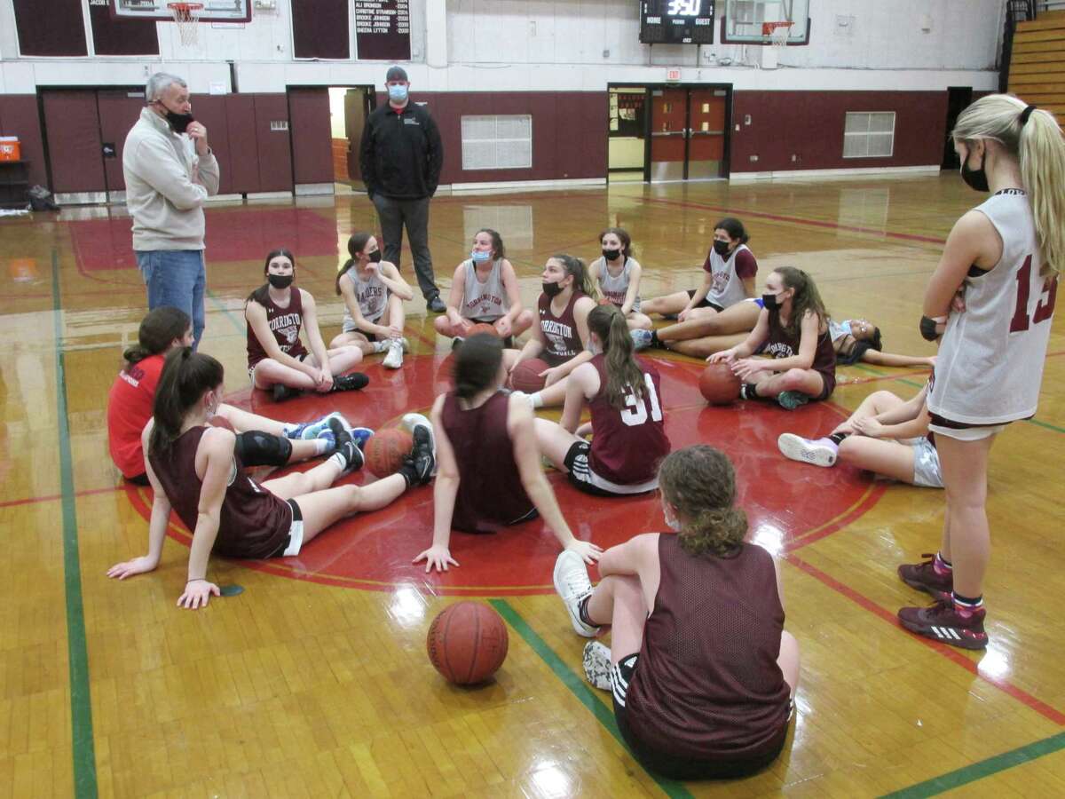 The Lady Raiders catch their breath at a Torrington practice session Wednesday following a string of five tough games in seven days.