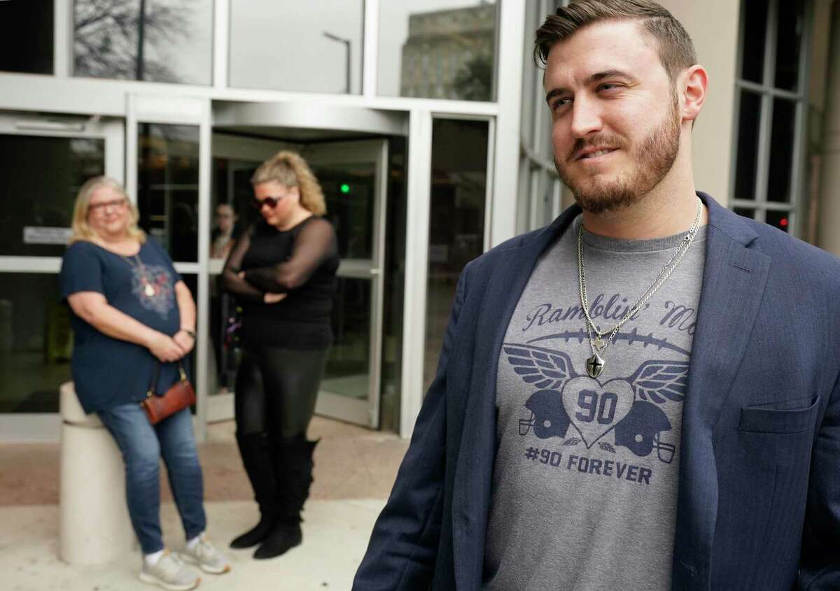 Grayson Gadgett, right, speaks to the media about his late cousin Blain Padgett outside the Bob Casey United States Courthouse, 515 Rusk St., Thursday, Feb. 20, 2020, in Houston. Stuart “Mooch” Mouchantaf, a former Rice University football player, charged in the 2018 opioid-induced death of Blain Padgett, pleaded guilty to conspiracy to possess with the intent to distribute causing death and possession with the intent to distribute causing death.