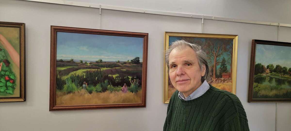 Bruce Zboray, shown, and a local artist, is currently exhibiting his paintings in the gallery at the Plumb Memorial Library in Shelton.