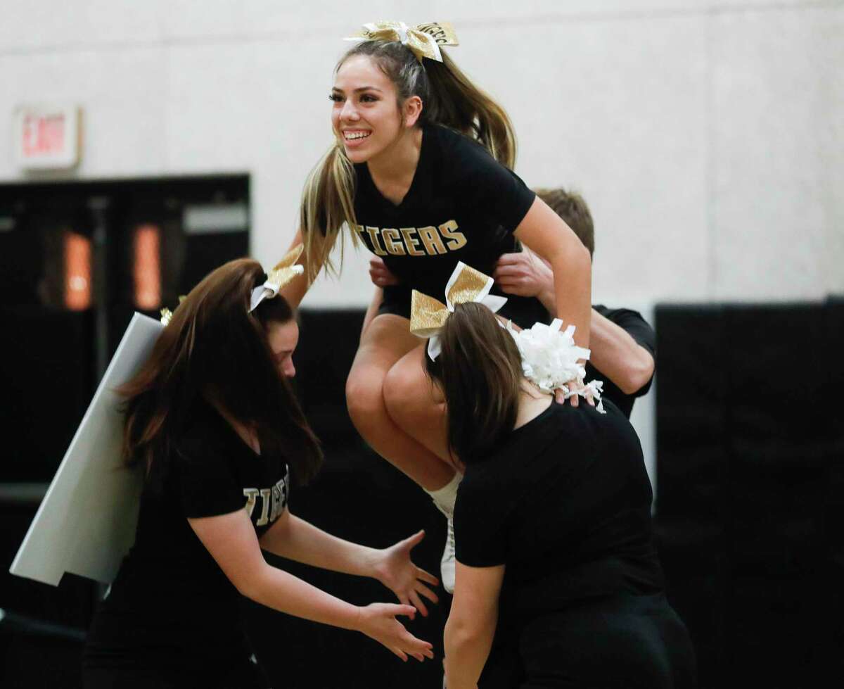 Conroe High School cheerleaders perform the routine that placed them fourth at this year’s Universal Cheerleaders Association national competition.