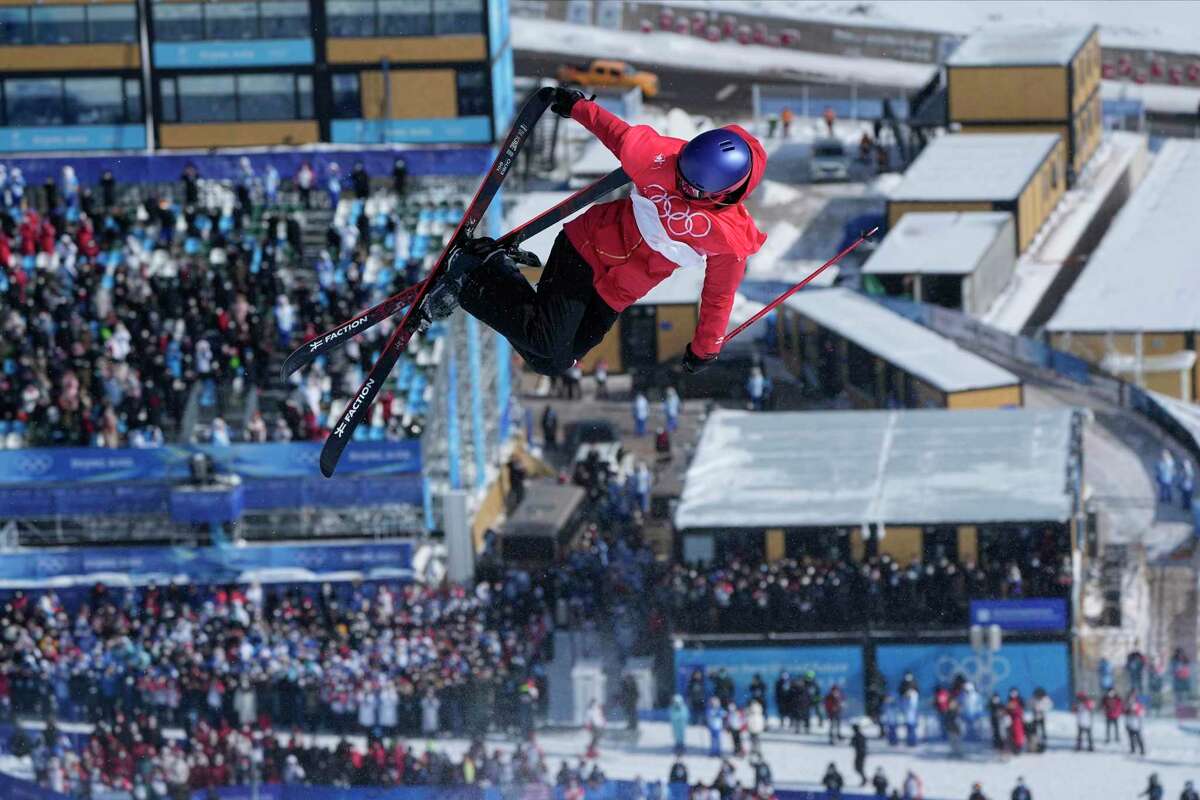 China's Eileen Gu competes during the women's halfpipe finals at the 2022 Winter Olympics, Friday, Feb. 18, 2022, in Zhangjiakou, China. (AP Photo/Gregory Bull)