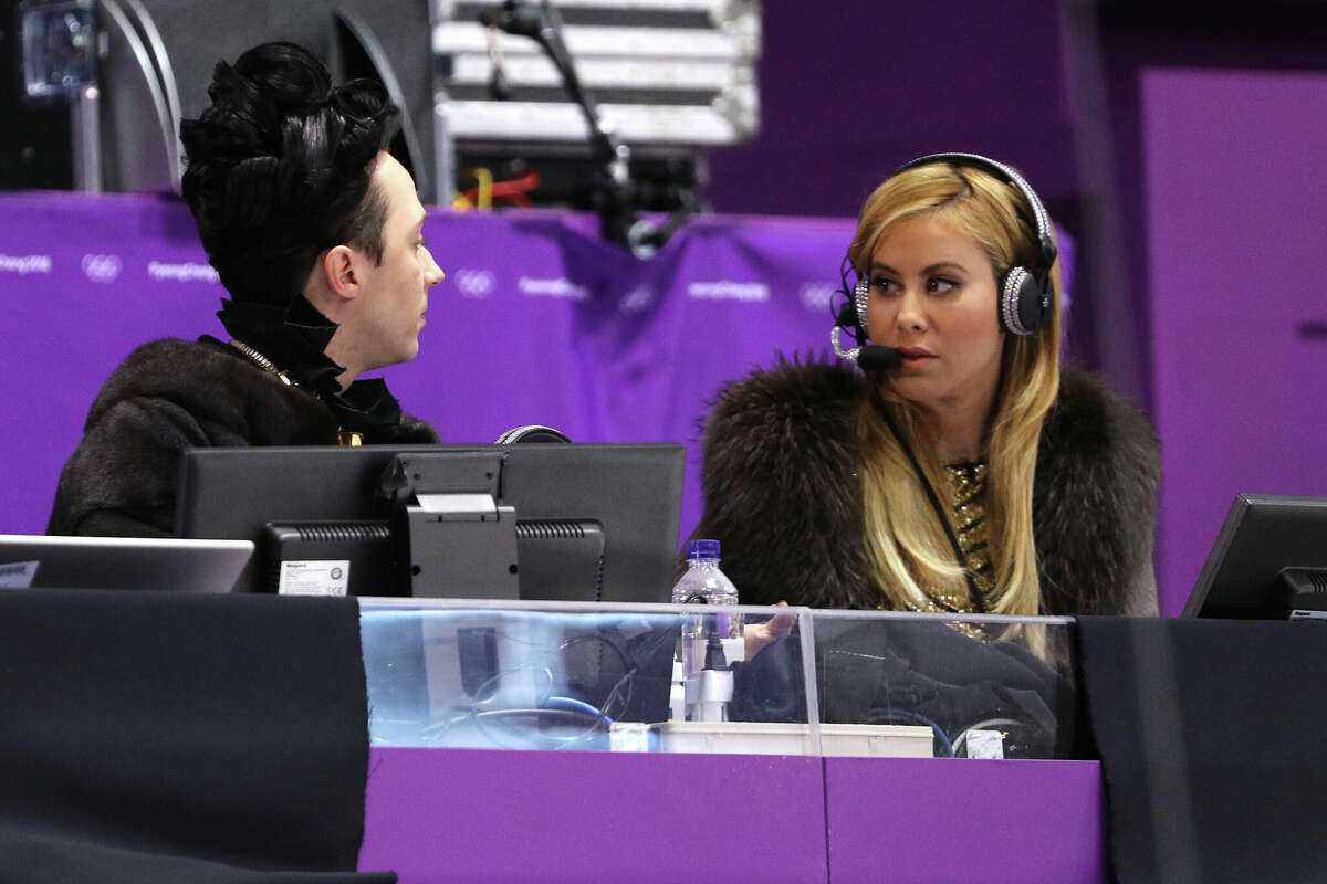 GANGNEUNG, SOUTH KOREA - FEBRUARY 21: TV personalities and former figure skaters Johnny Weir (L) and Tara Lipinski look on during the Ladies Single Skating Short Program on day twelve of the PyeongChang 2018 Winter Olympic Games at Gangneung Ice Arena on February 21, 2018 in Gangneung, South Korea. (Photo by Maddie Meyer/Getty Images)