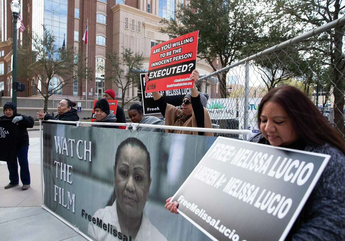 Family members of Melissa Lucio, a Latina woman facing execution in Texas this April, ask Gov. Greg Abbott to stop her execution at an event Friday, Feb. 18, 2022, across the street from Harris County Criminal Justice Center in Houston.
