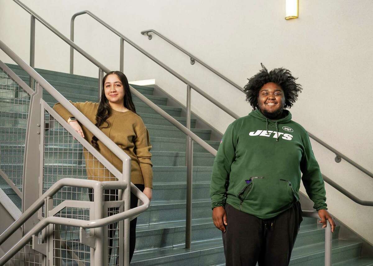 Southern Connecticut State University education students Mahnoor Khalid, left, and Rickqueal D. Warren, right, are part of a pandemic-inspired program that helps with the shortage of staffing in K-12.