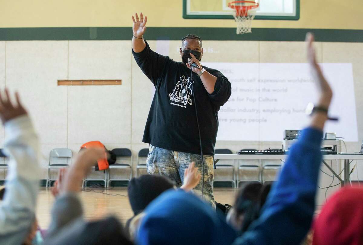 Hip Hop For Change education director Marlon Richardson addresses students during a school assembly at Lagunitas Elementary in San Geronimo. The Oakland-based nonprofit ended talks to conduct an assembly at a Palo Alto elementary school after a PTA leader asked it to censor some of its materials.