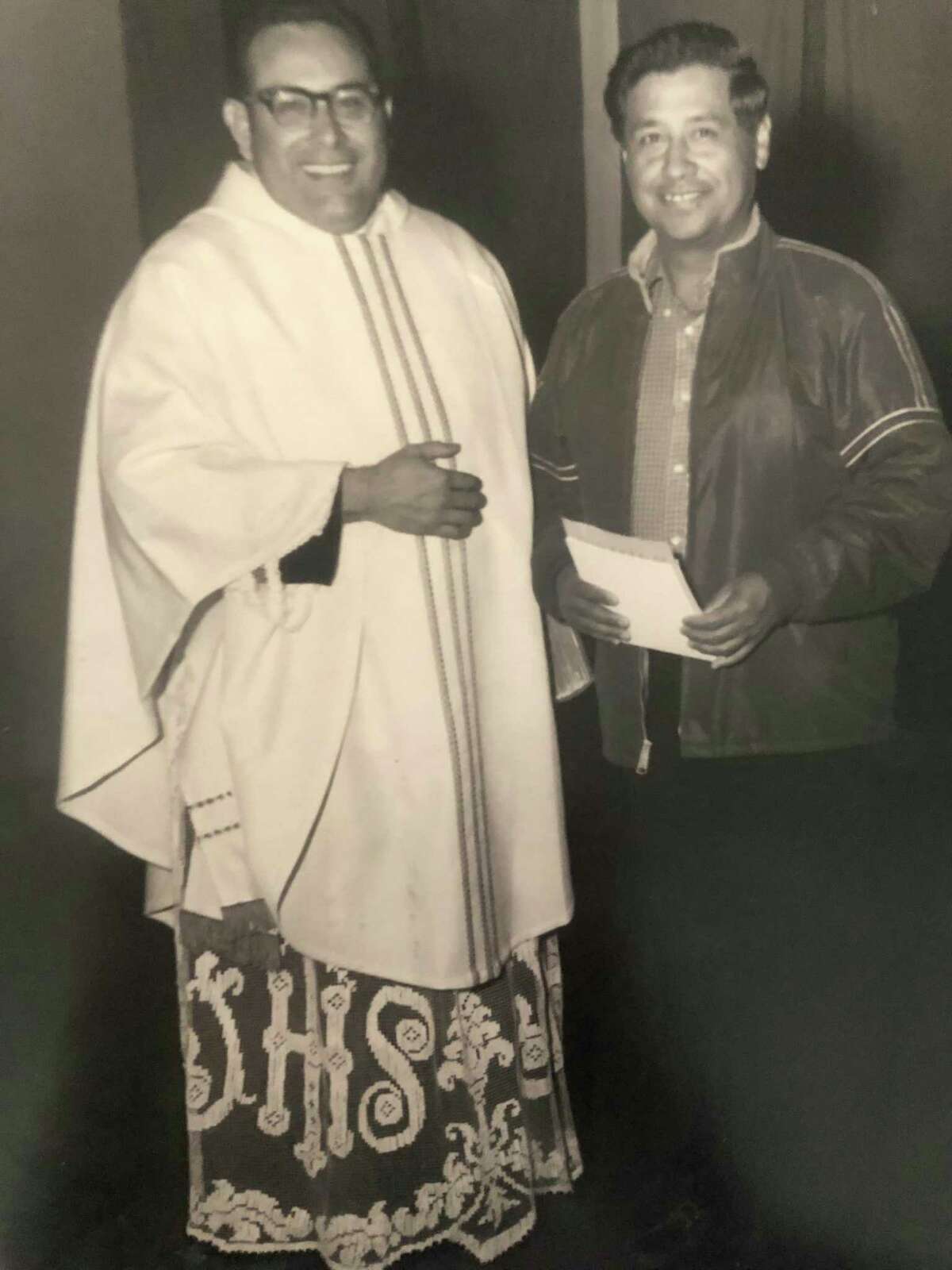 Father Rafael "Ralph" Ruiz with United Farm Worker founder Cesar Chavez sometime in the 1960s in Texas.