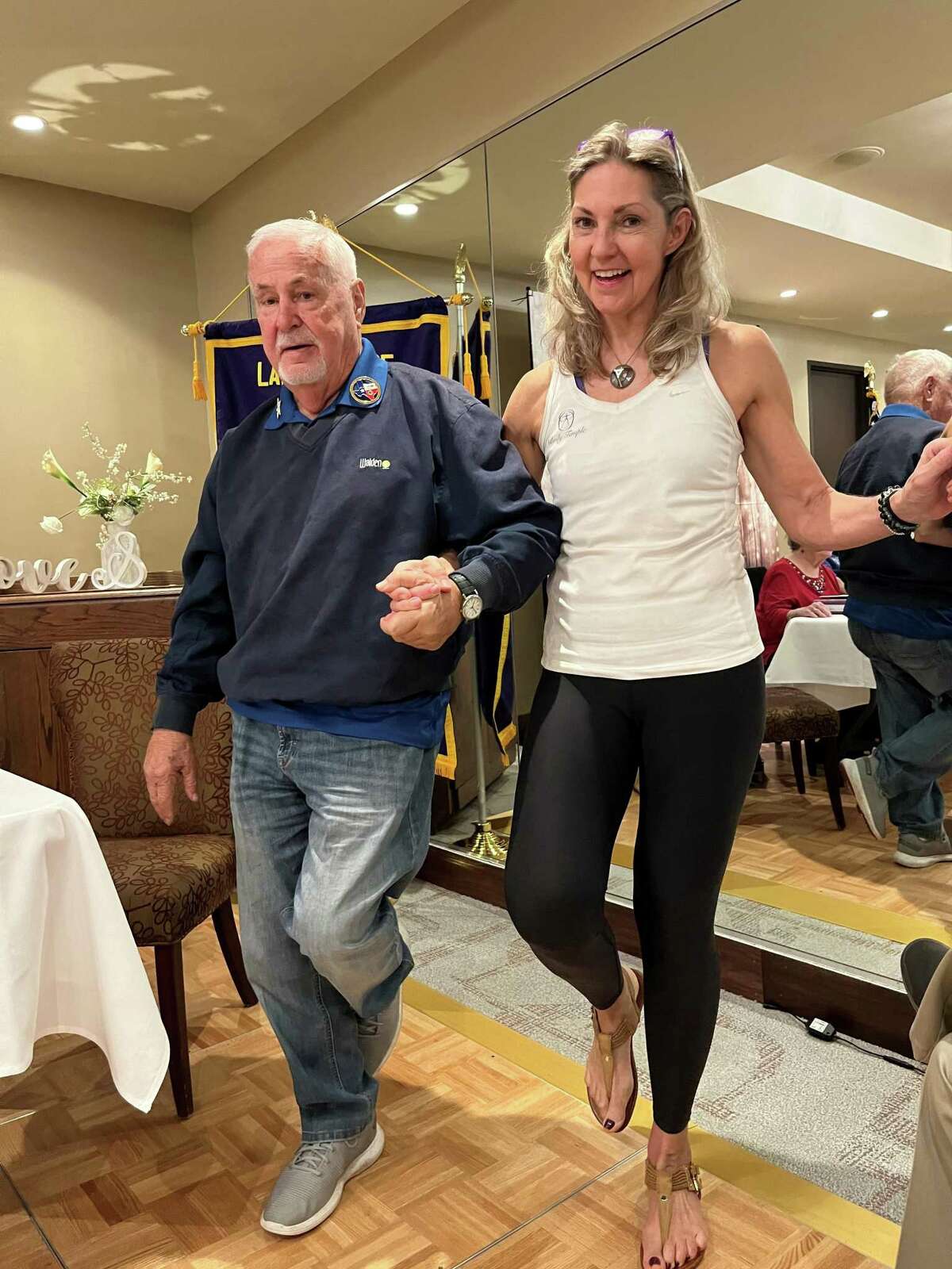 Lake Conroe Centennial Lions Club welcomed Jimmie Lene Read at their last General Meeting who delivered a program entitled "Bringing Balance in 2022". Shown above practicing balancing techniques are LCCLC member Bob Drucker with Jimmie Read.