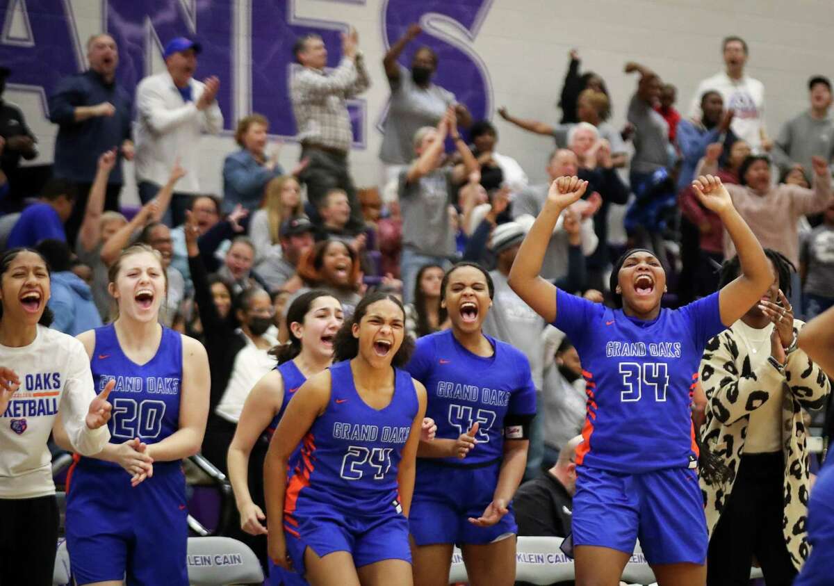 Grand Oaks High School Grizzlies players during the second half of a Region II-6A area girl’s basketball playoff game Friday, Feb. 18, 2022, at Klein Cain High School in Houston.