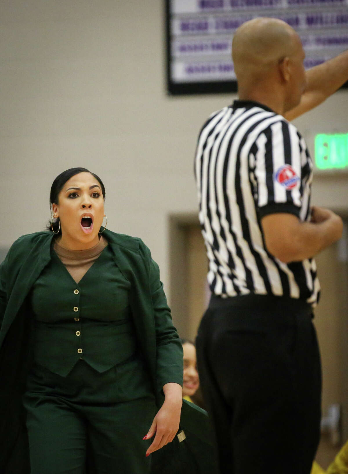 Cypress Ranch High School Lady Mustangs Megan Daniel reacts during the first half of a Region II-6A area girl's basketball playoff game Friday, Feb. 18, 2022, at Klein Cain High School in Houston.