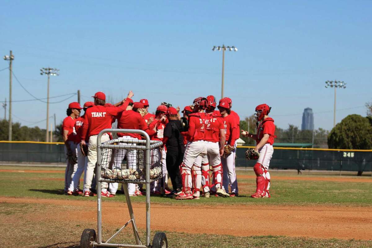 The Bellaire baseball team huddles on the mound during the program's Family Day on Jan. 29.