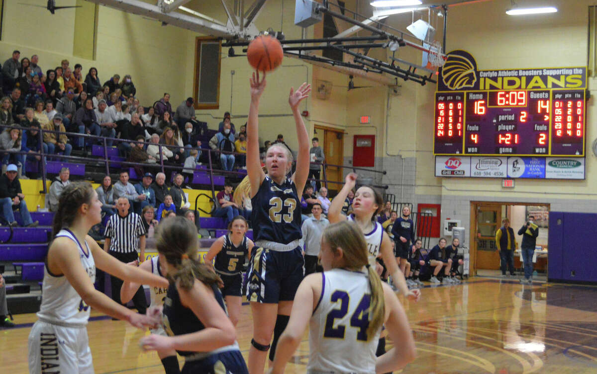Sami Oller shoots a jumper against Carlyle in the Class 1A Carlyle Regional Championship game. Carlyle beat FMCHS 51-39. 