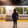 A passenger waits to board a BART train in San Francisco, Calif., on Feb. 15, 2022.