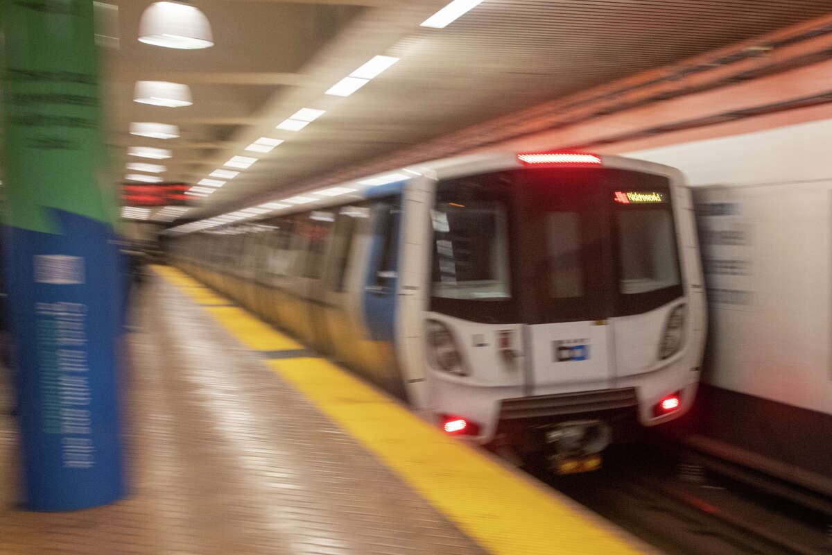 FILE - A BART train arrives at Powell Street station in San Francisco, Calif., on Feb. 15, 2022.