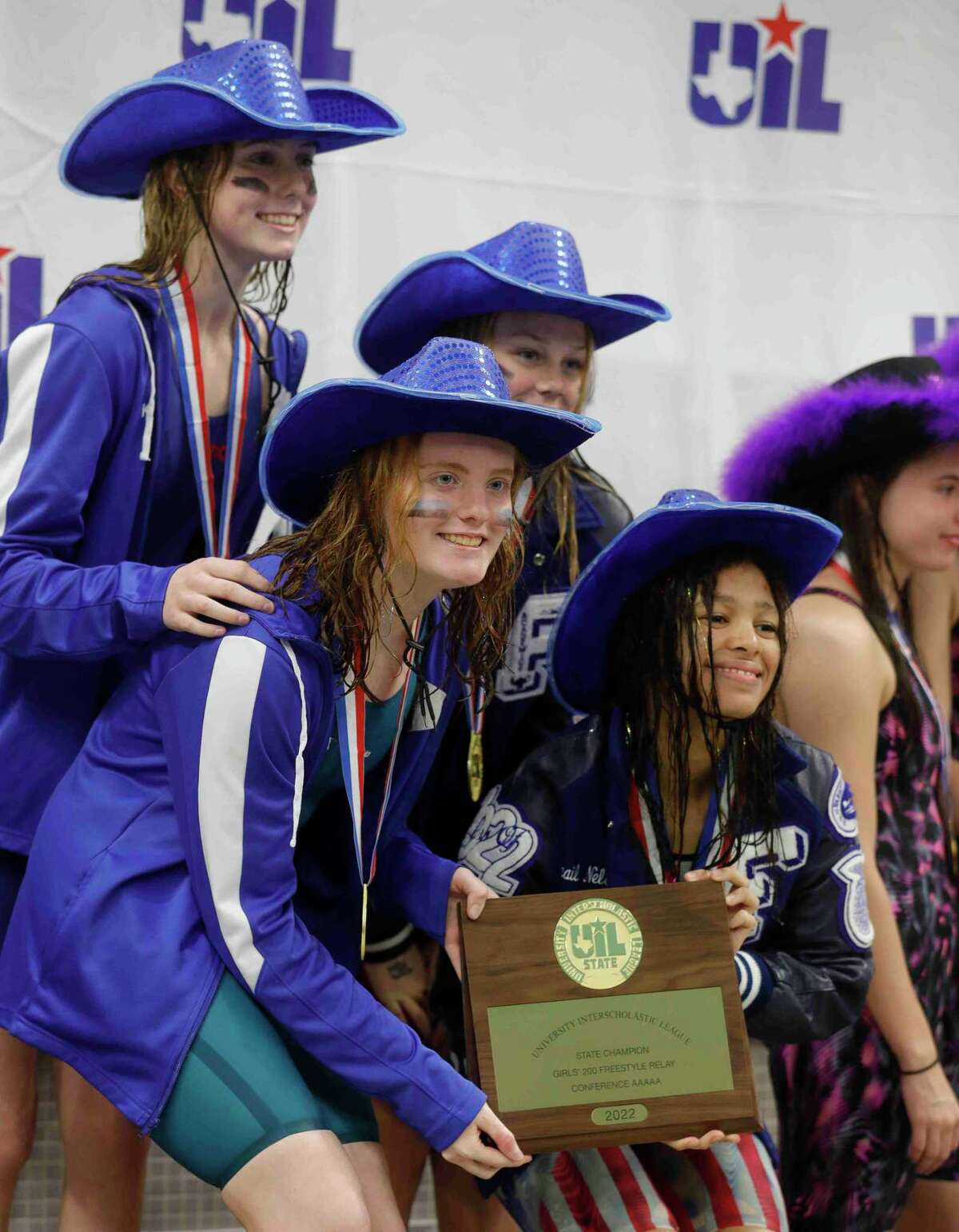 Friendswood earned the gold medal in the Class 5A girls 200-yard freestyle relay Saturday at the UIL State Swimming and Diving Championships in Austin. Team members are Leah Givens, Peyton Becker, Andelynn Jeanes and Abigail Nelson.