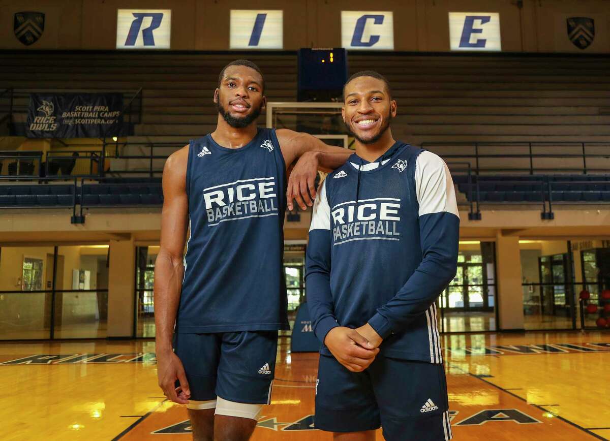 Rice basketball players Carl Pierre, left, and Travis Evee during practice at Tudor Field House on the campus of Rice University on Thursday, Feb. 10, 2022 in Houston.