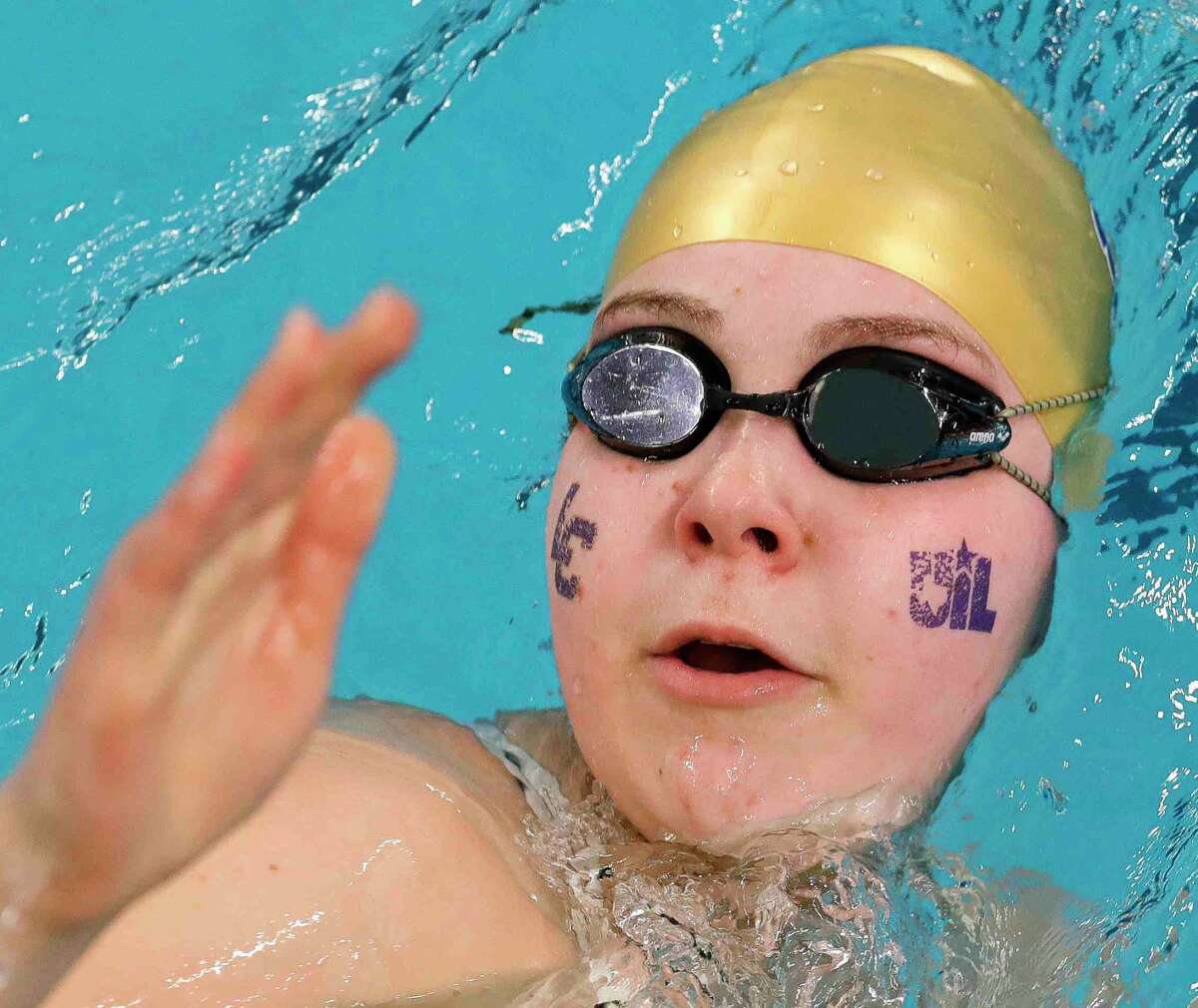 Lake Creek’s Ella Britt warms up before the Class 5A portion of the UIL State Swimming and Diving Championships at Lee & Joe Jamail Texas Swimming Center, Saturday, Feb. 19, 2022, in Austin.