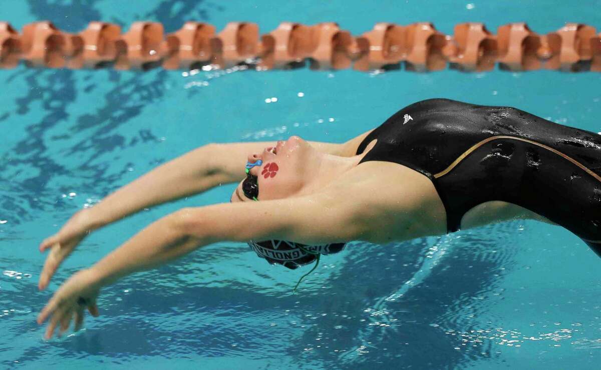 Magnolia competes in the Class 5A girls 200-yard medley relay during the UIL State Swimming and Diving Championships at Lee & Joe Jamail Texas Swimming Center, Saturday, Feb. 19, 2022, in Austin.