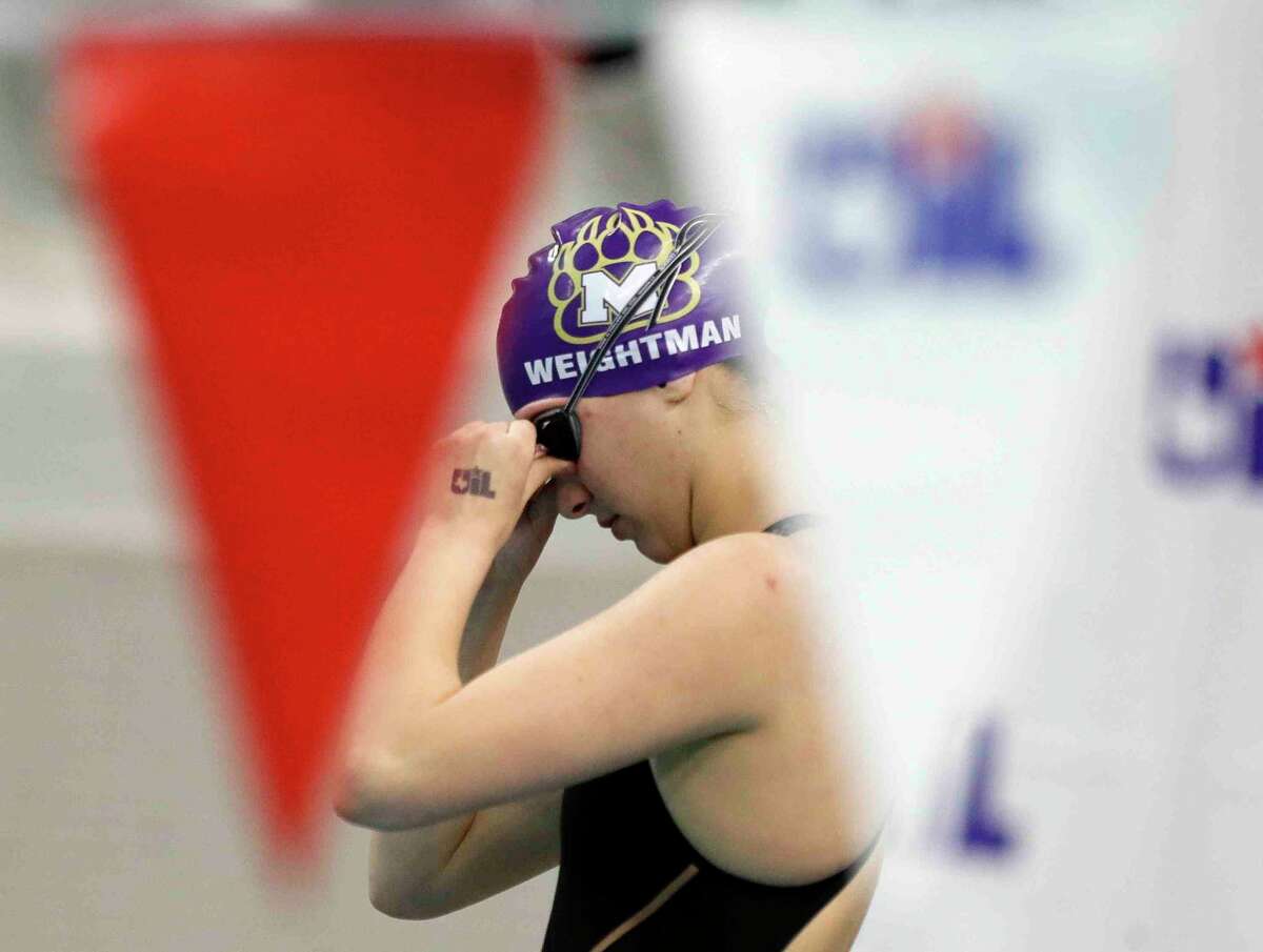 Kaitlyn Weightman of Montgomery is seen before competing in the Class 5A girls 200-yard freestyle during the UIL State Swimming and Diving Championships at Lee & Joe Jamail Texas Swimming Center, Saturday, Feb. 19, 2022, in Austin.