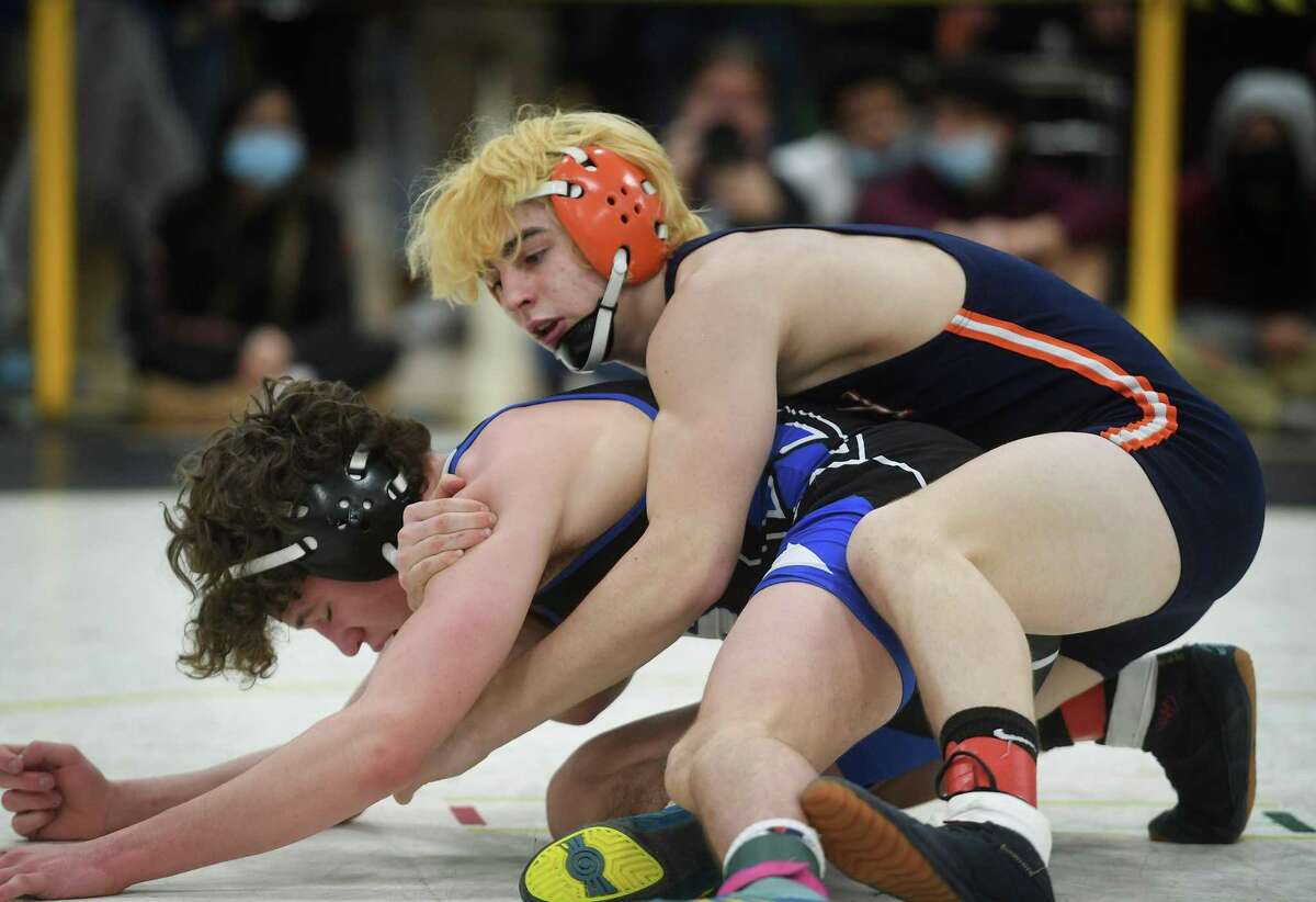 Trumbull, New Milford, Xavier claim wrestling tournament titles