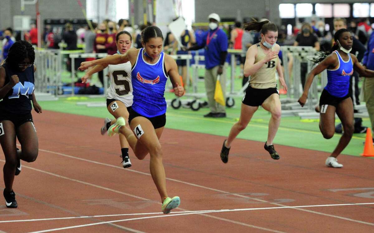 Danbury’s Alanna Smith finishes first in the 55-meter dash during the State Open in New Haven on Saturday.